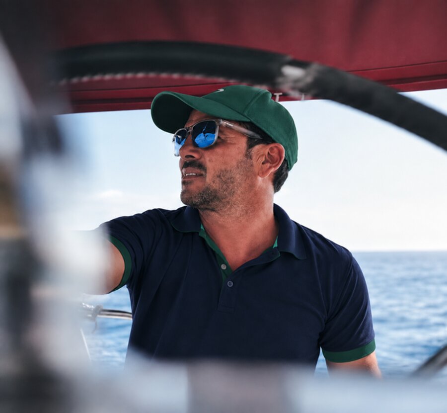 Captain David Llobera at the helm